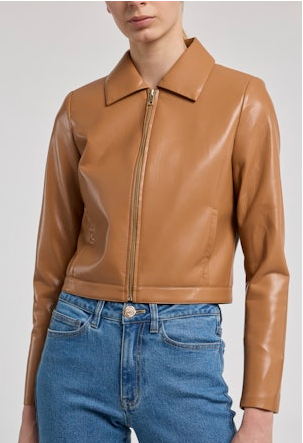 Brown leather jacket worn by a person on a white background
